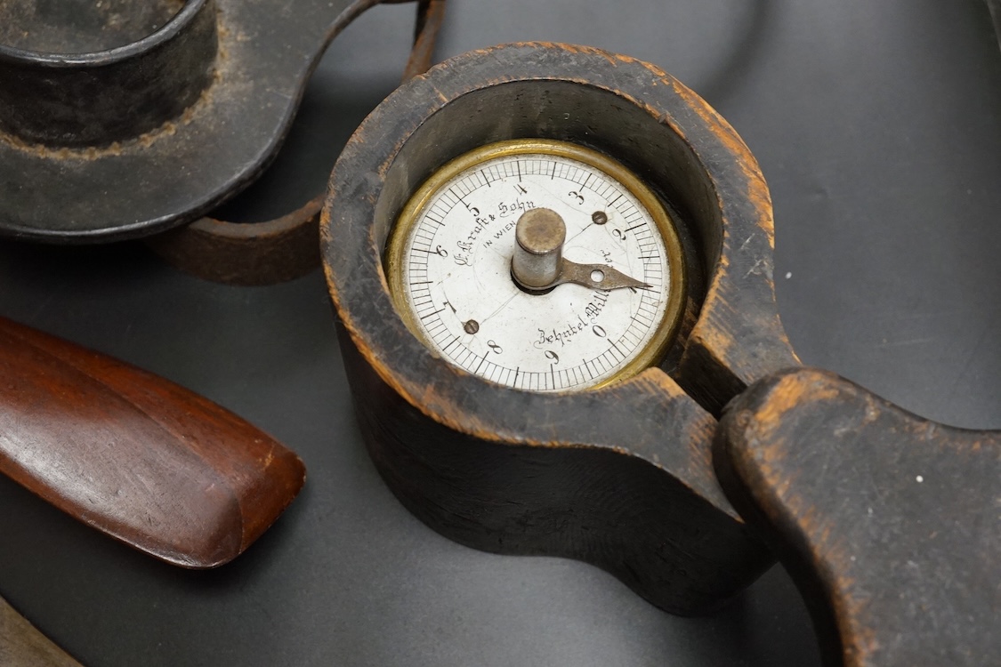 A collection of military equipment, clock, silver commemorative dish etc (6). Propeller mantel clock 41cm wide.